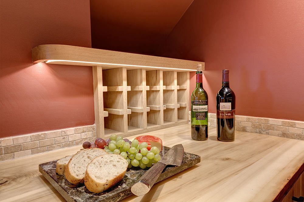 Wine room built in under the stairs. 