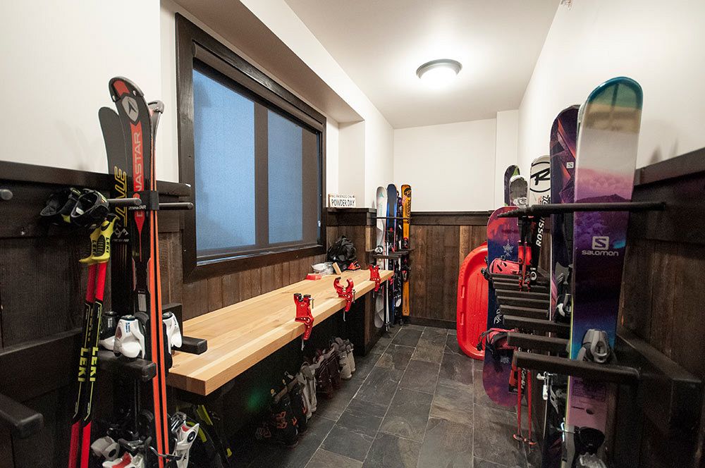 Custom built ski work bench and ski/equipment rack.
